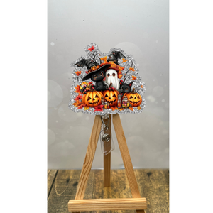 Pumpkin Patch Pals Badge Pull featuring a ghost, black cats, and pumpkins on a silver glitter background.