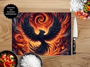 Decorative cutting board with a phoenix design on a wooden surface with a knife and ingredients.