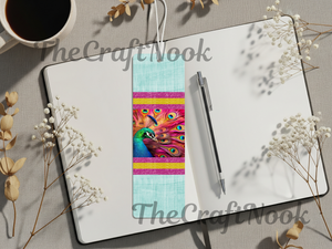 Aluminum peacock bookmarks featured on a notebook with floral accents and a coffee cup.
