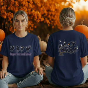 A woman shown from the front and back wearing a navy blue graphic t-shirt. The front features a graphic of four black crows with the text 'Support Your Local Murder' in white.