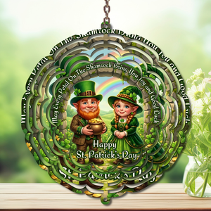 St. Patrick's Day wind spinner featuring a leprechaun and girl with a pot of gold, bright green colors and rainbow design.