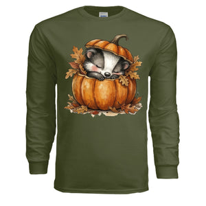 Cozy Badger Long Sleeve Tee in military green featuring a cute badger in a pumpkin surrounded by leaves.