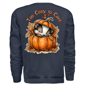 Too Cozy to Care Sweatshirt featuring a cute graphic of a badger in a pumpkin, a cozy sweatshirt with pocket.