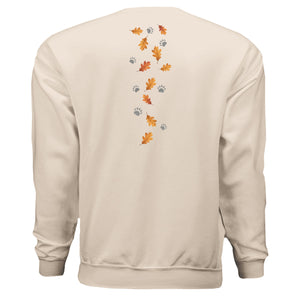 Back view of forest edition badger sweatshirt with autumn leaves and paw prints design.