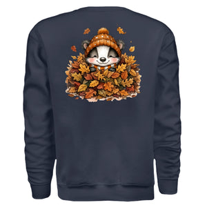 Leaf Pile Badger Sweatshirt featuring cute badger in a pile of autumn leaves with a cozy beanie.