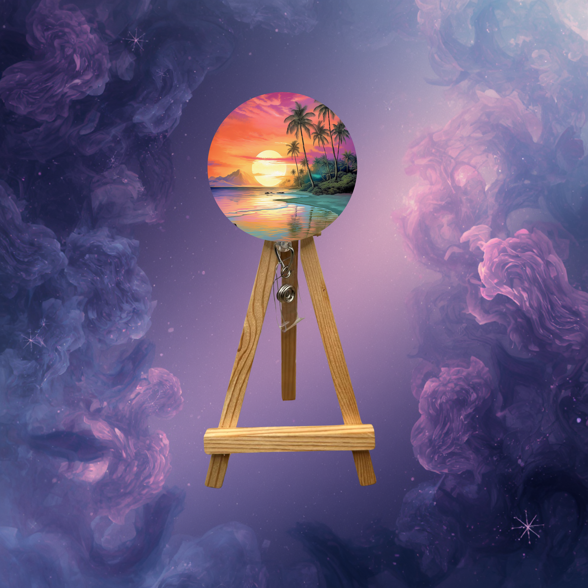 Beach badge pulls with glitter options displayed on a wooden easel showcasing a vibrant coastal sunset design.