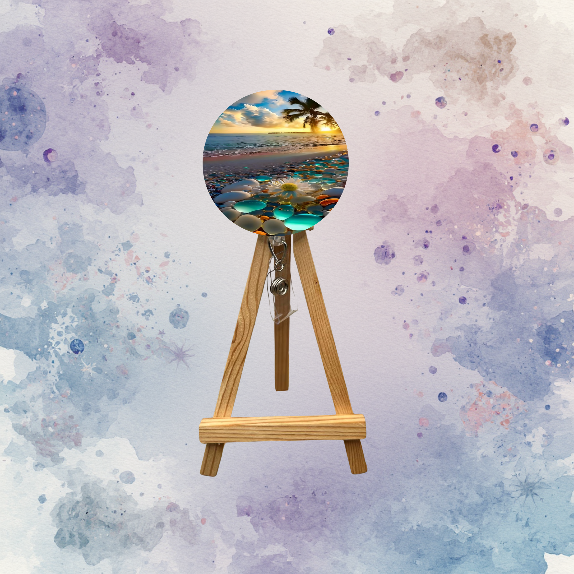 Beach badge pulls with glitter options displayed on a wooden easel featuring a coastal design.