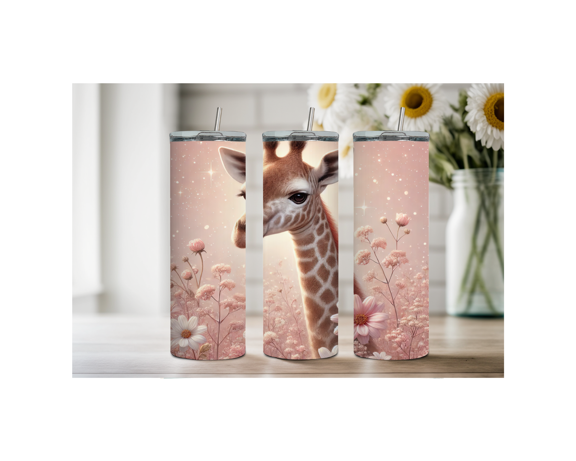 Giraffe stainless steel tumbler trio on a tabletop, featuring floral designs and a charming giraffe illustration.