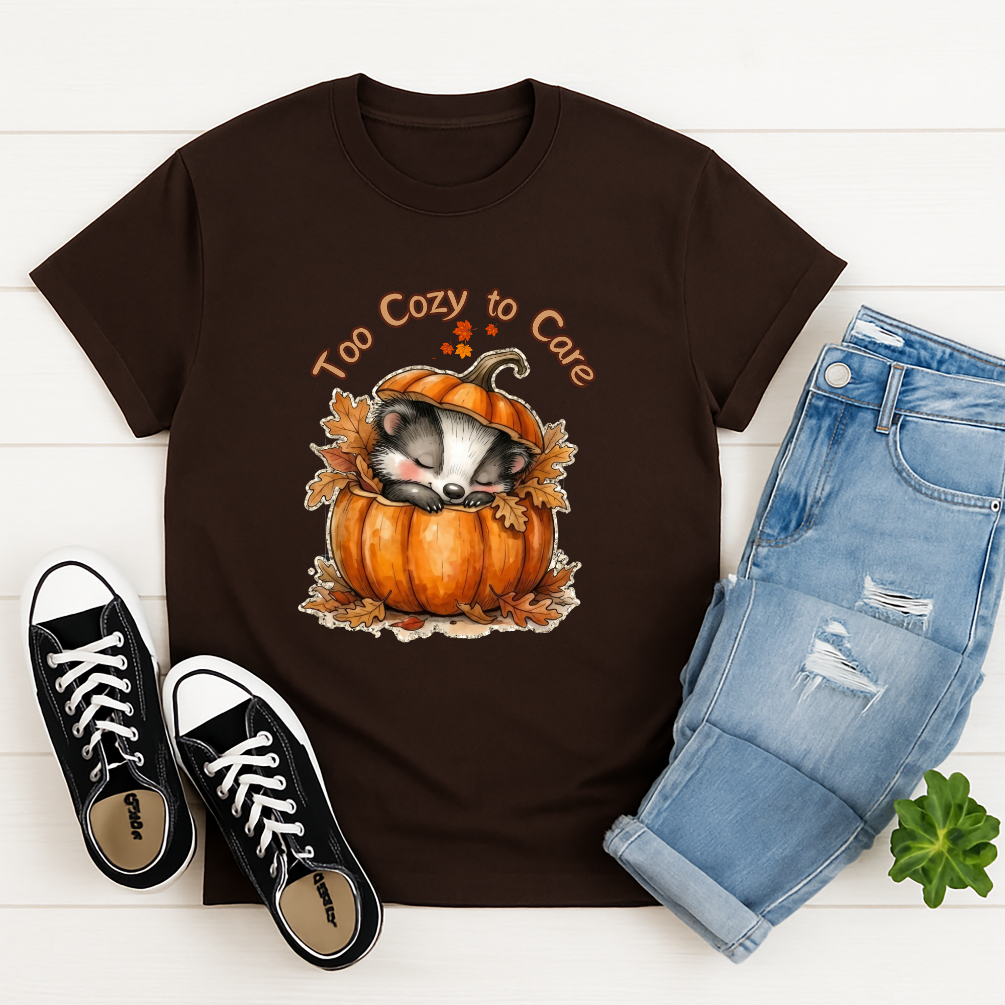 Too Cozy Graphic Tee featuring a cute badger in a pumpkin, perfect cozy graphic tee for fall.