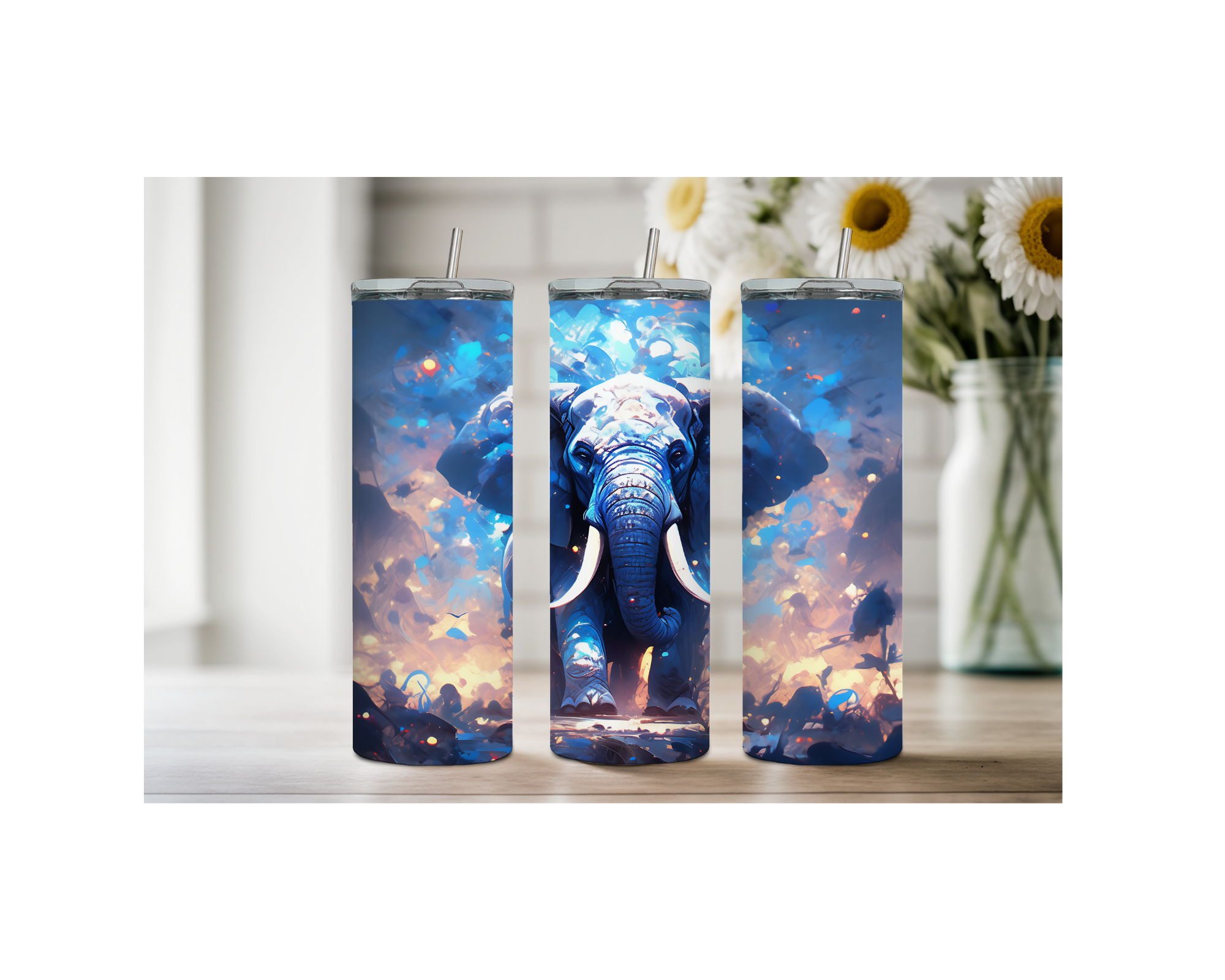 Three elephant stainless steel tumblers featuring whimsical blue elephant artwork and a vibrant background on a wooden table.