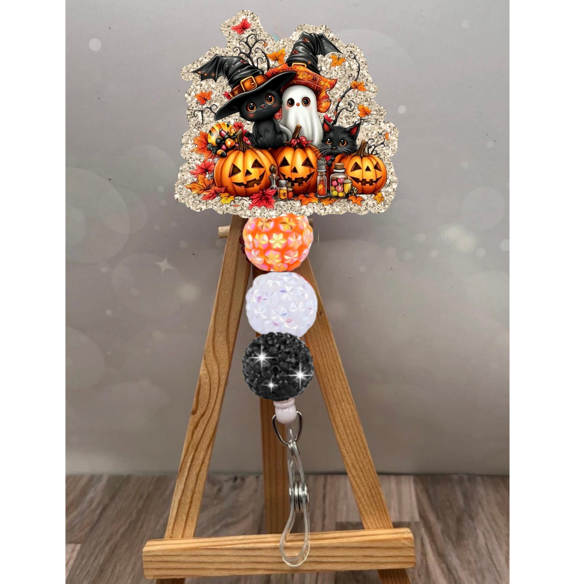 Pumpkin Patch Pals Badge Pull with glitter background, featuring pumpkins, cats, and a ghost, perfect for fall work vibes.