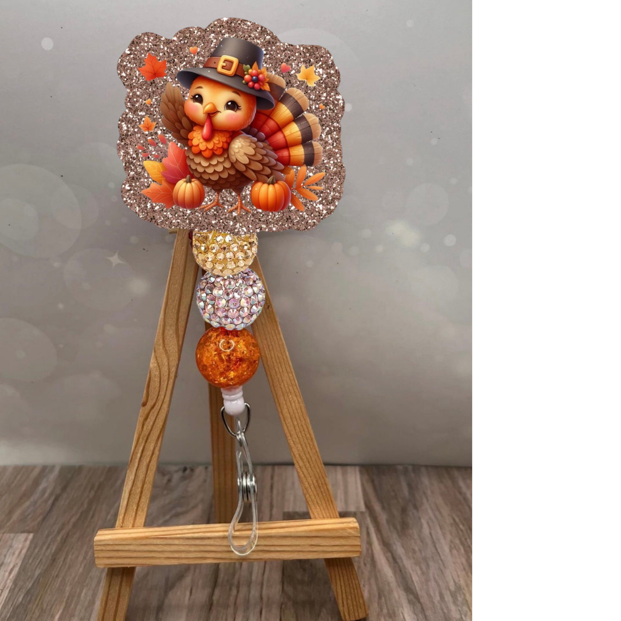 Cute Turkey Badge Pull featuring a glittery turkey design and colorful beads on a retractable badge reel.