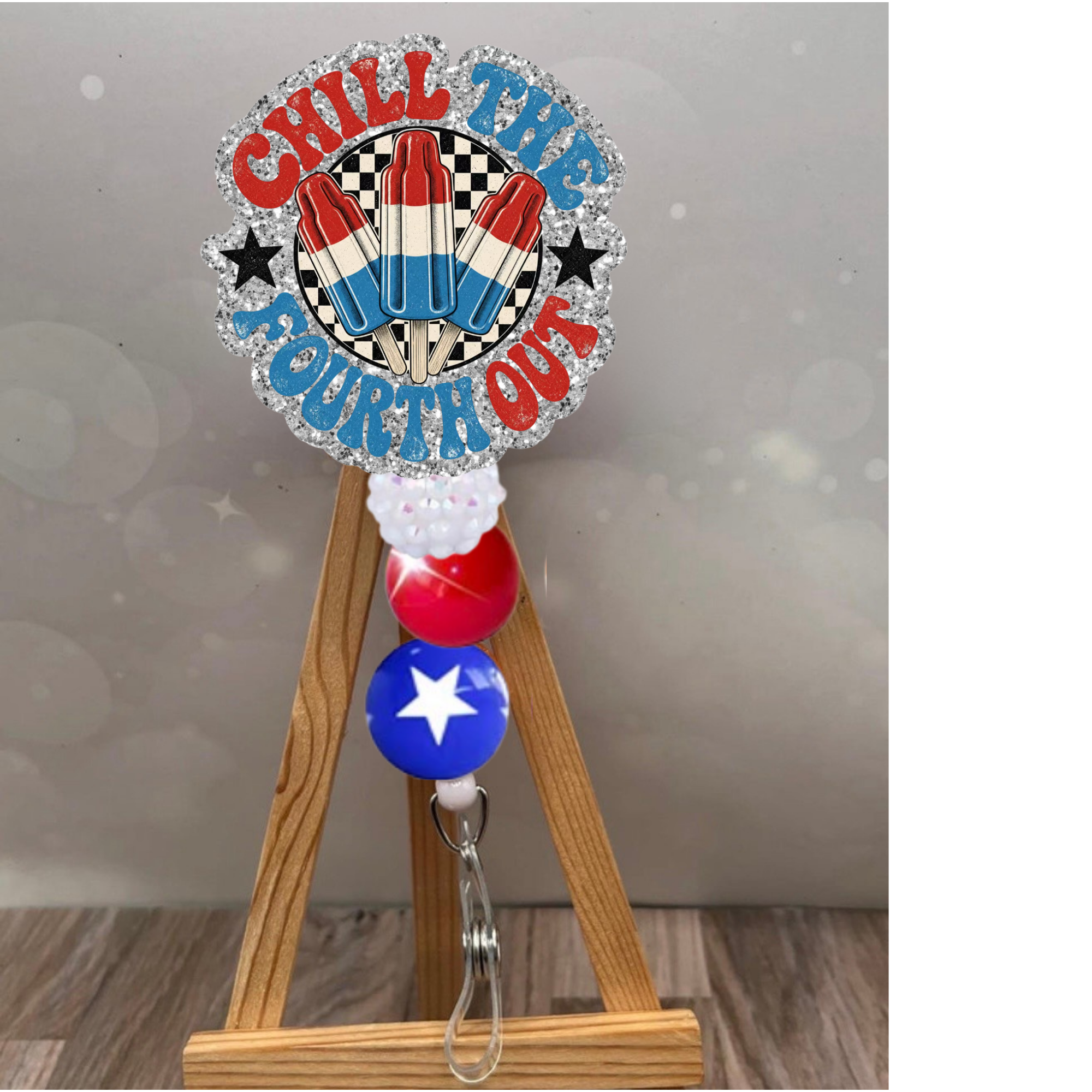 Chill the Fourth Out badge reel with glitter background and patriotic colors, perfect for 4th of July celebrations.