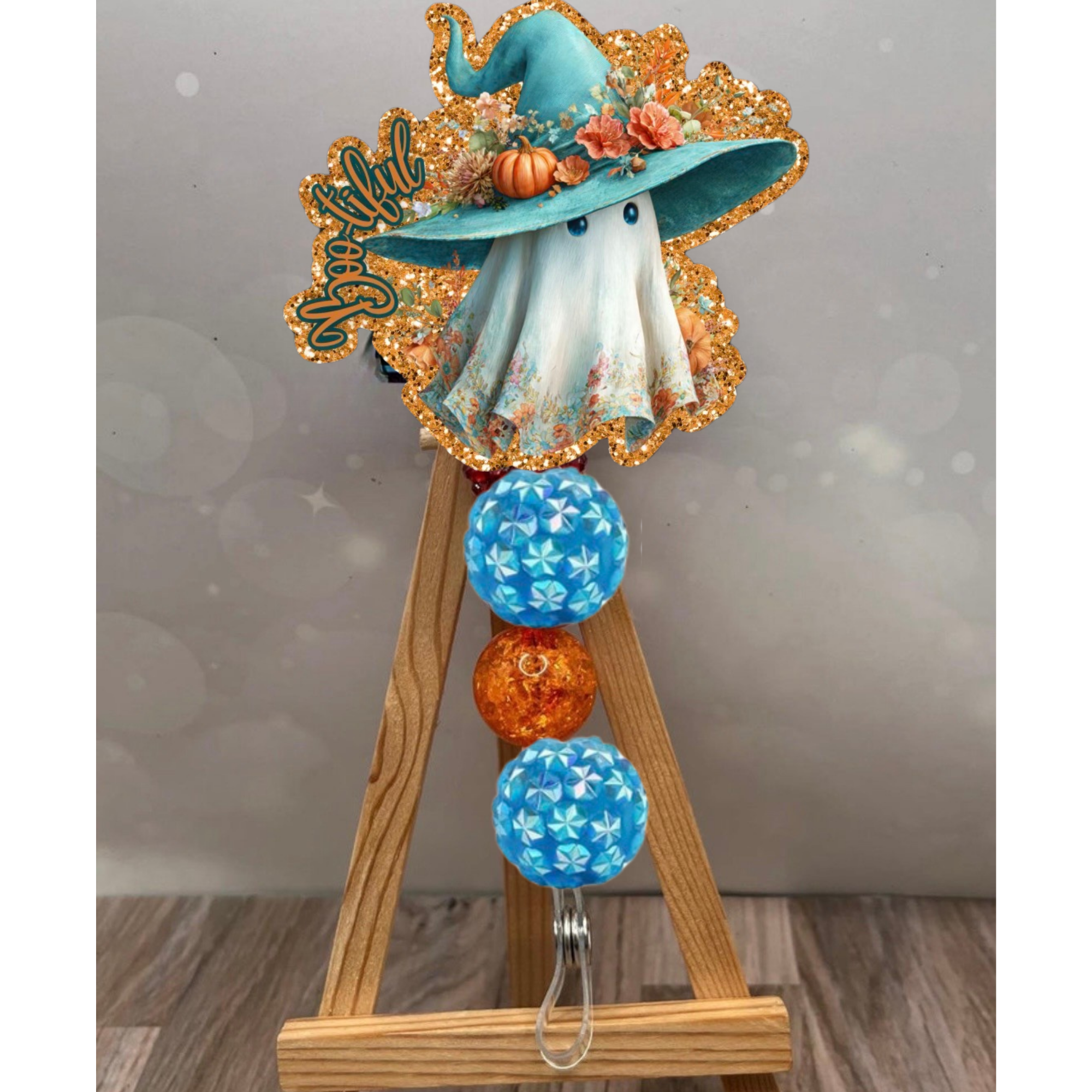 Boo-tiful Badge Pull featuring a ghost design, orange and blue beads. Perfect Halloween badge reel accessory.