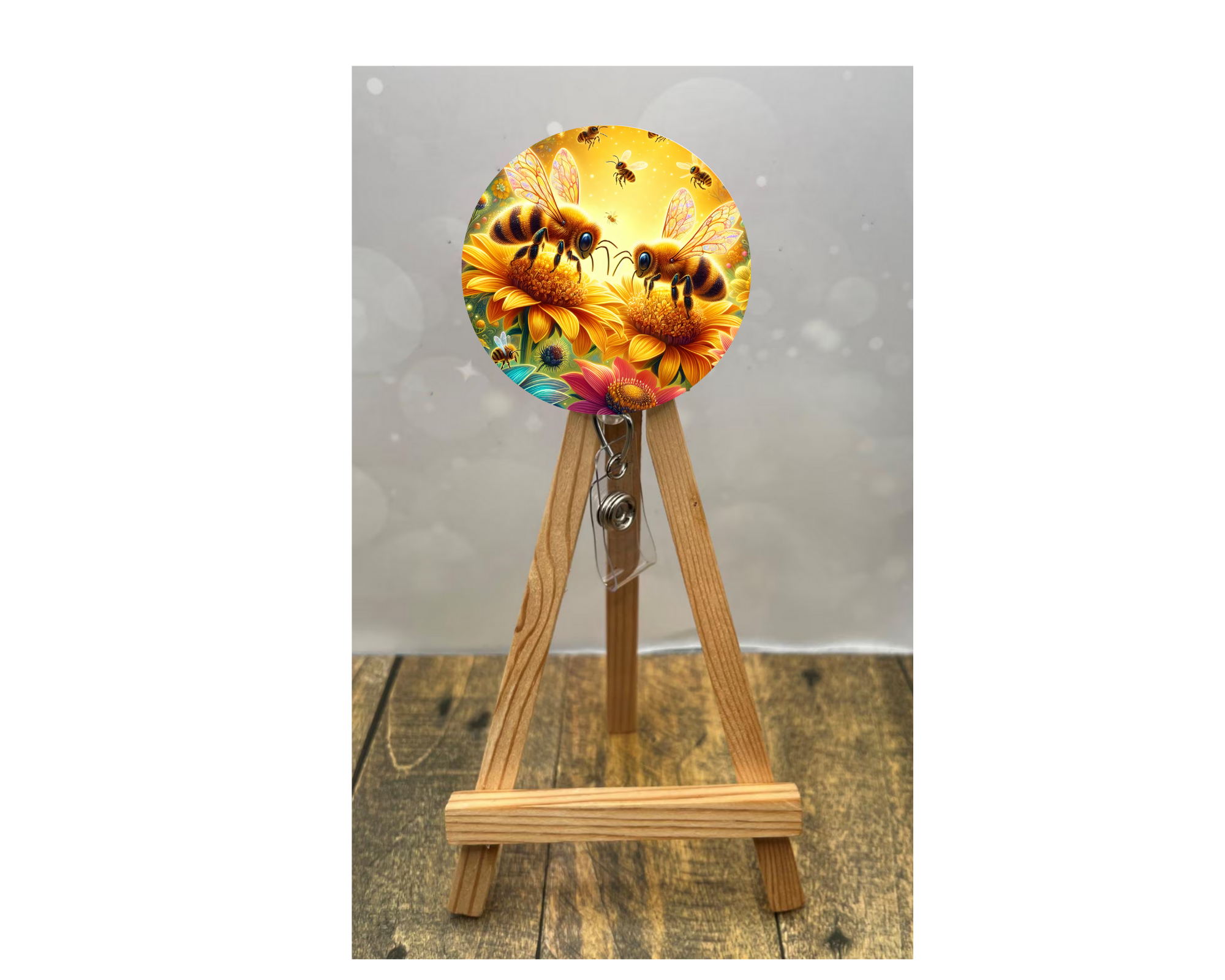 Cute honeybee badge pulls featuring colorful bees and sunflowers on a badge reel, adding charm to your work uniform.