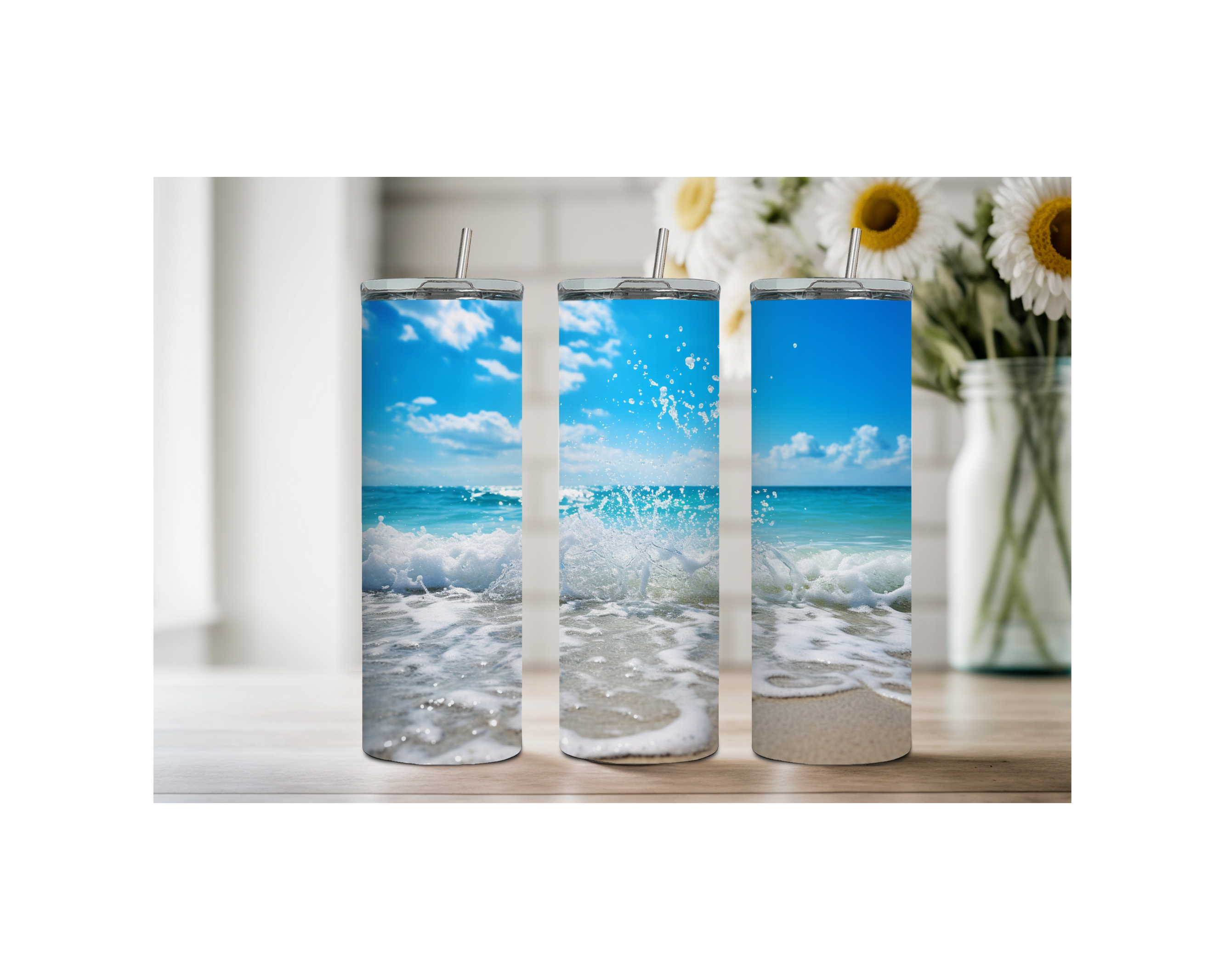 Three beach stainless steel tumblers with ocean wave designs, perfect for keeping drinks cold all day.