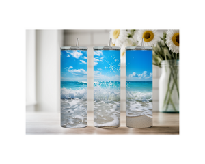 Three beach stainless steel tumblers with ocean wave designs, perfect for keeping drinks cold all day.