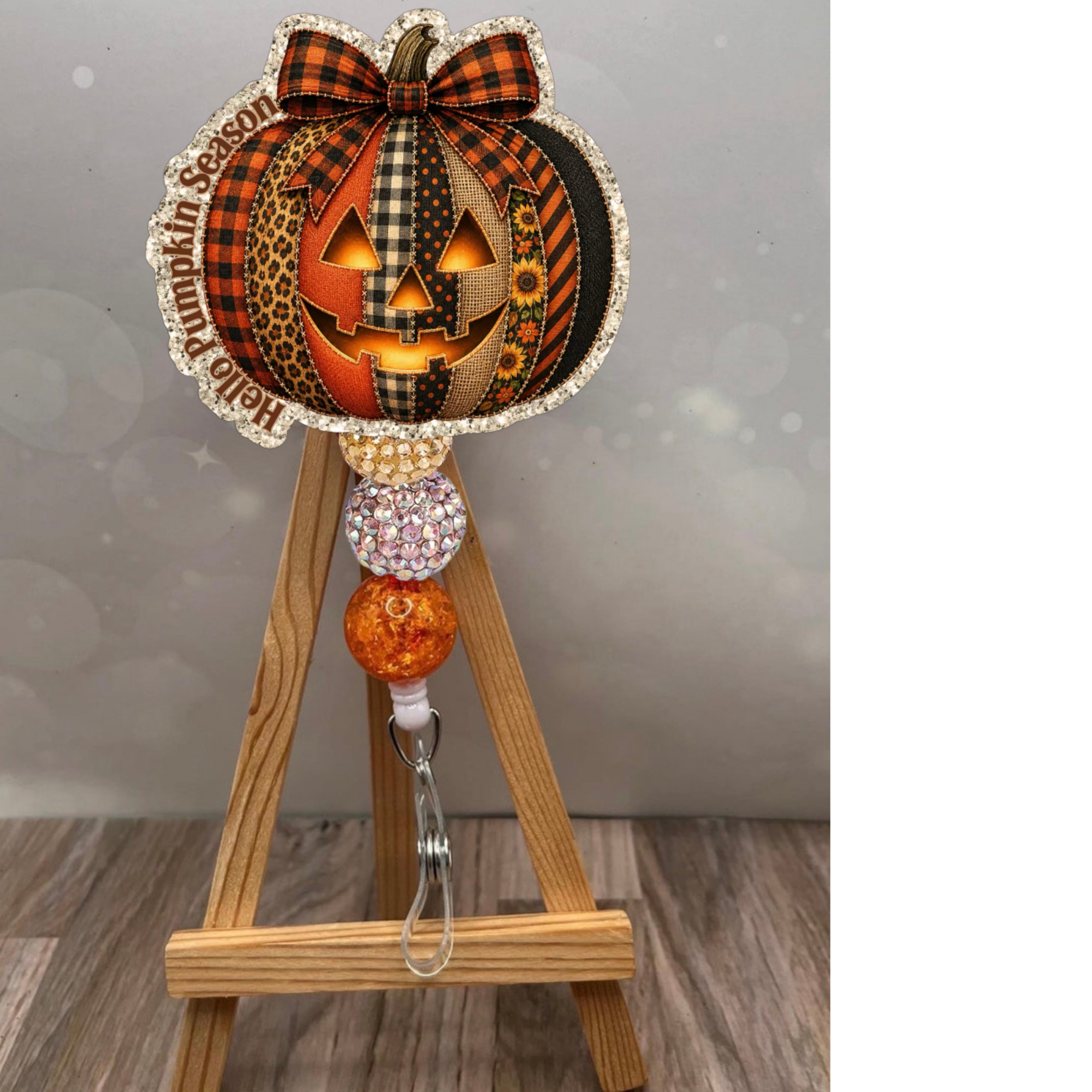 Hello Pumpkin Season Badge Pull with glitter background, featuring pumpkin design, perfect for fall at work. Pumpkin badge reel.