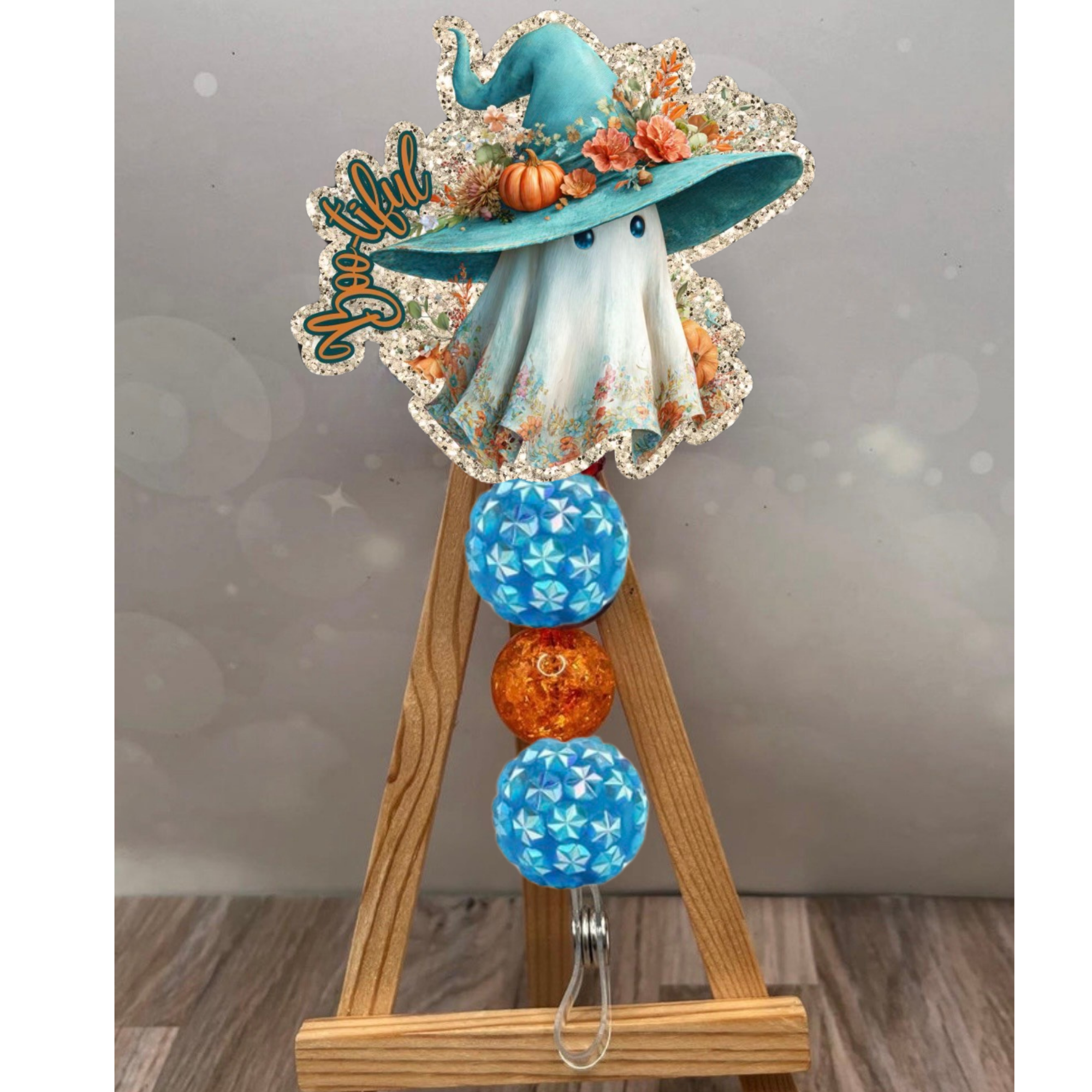 Boo-tiful badge pull for Halloween featuring ghost design and colorful beads. Perfect halloween badge reel accessory.