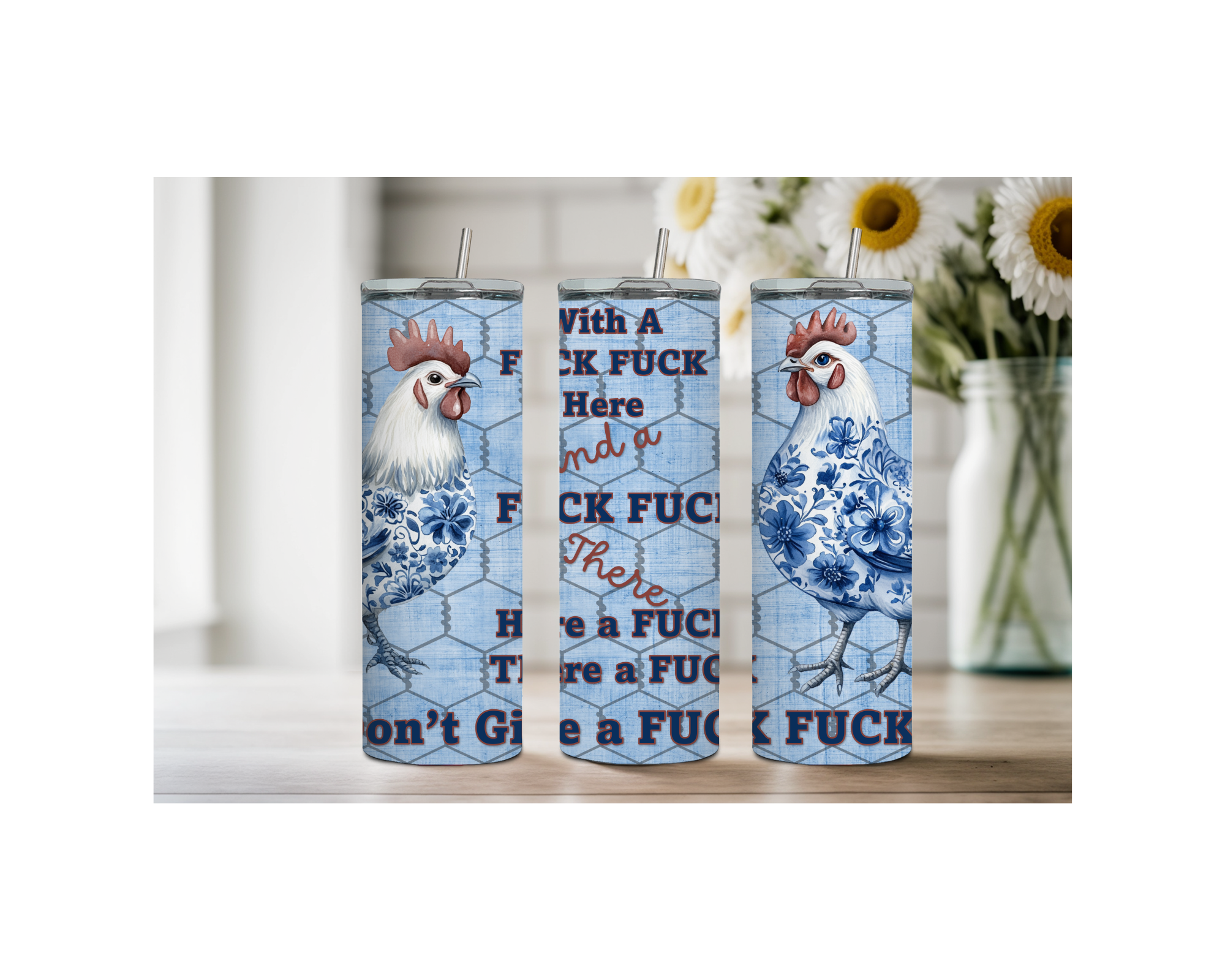 three 20 oz chicken stainless steel tumblers with humorous designs and floral chicken artwork on kitchen counter