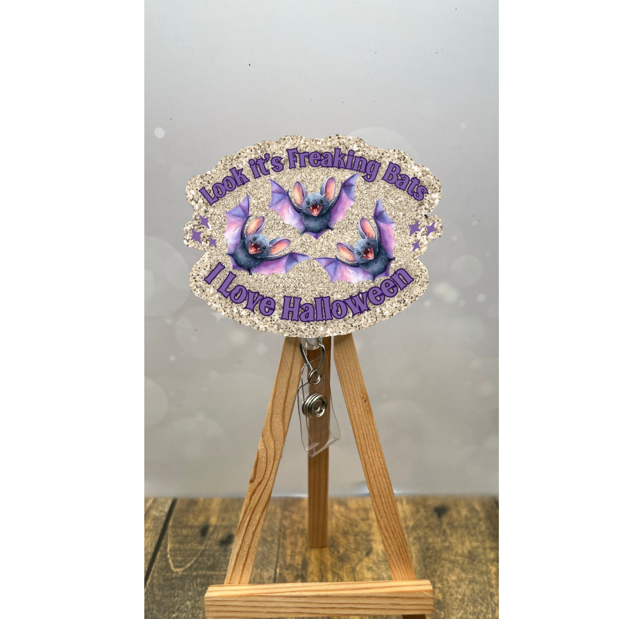 Look It's Freaking Bats Badge Pull with glitter background, perfect for a funny Halloween badge pull.
