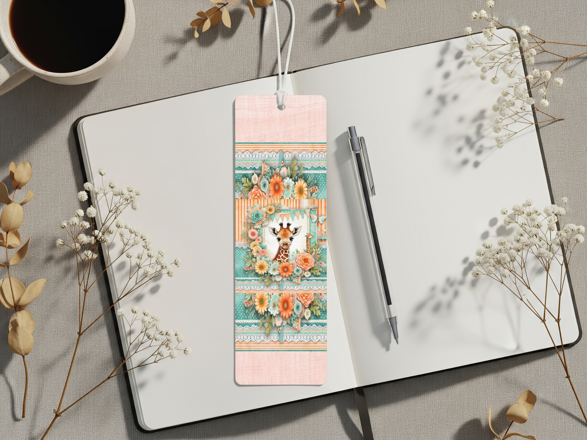Giraffe metal bookmarks displayed on a notebook with a coffee cup, featuring floral artwork and playful design.