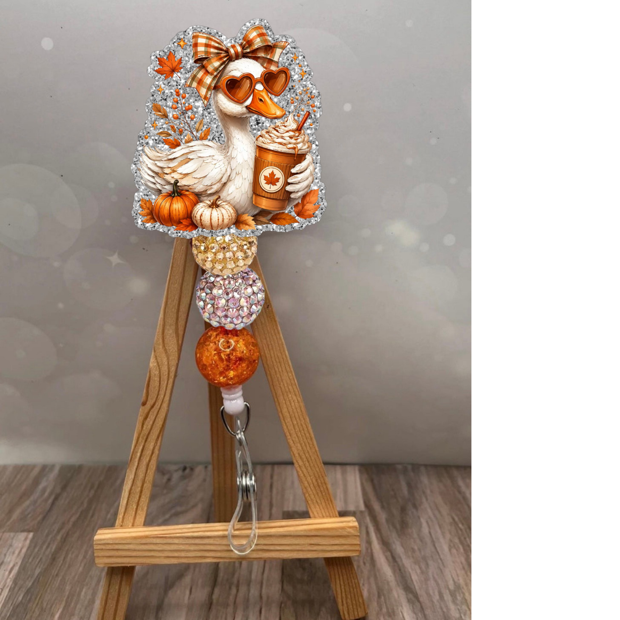 Fall Duck Badge Pull featuring a whimsical duck in sunglasses with pumpkins and glitter, perfect for fall season.