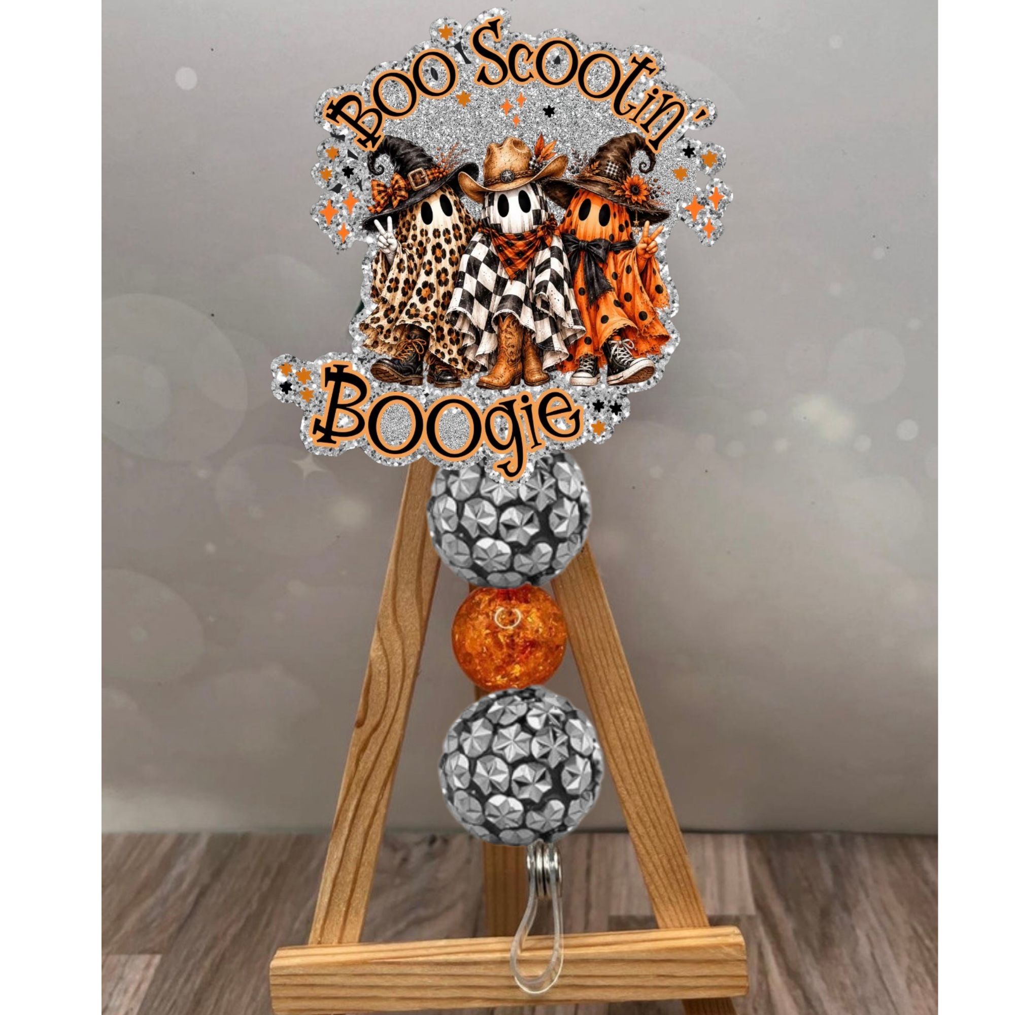 Boo Scootin Boogie Badge Pull featuring Halloween badge reel with ghost design, glitter background and bead accent.