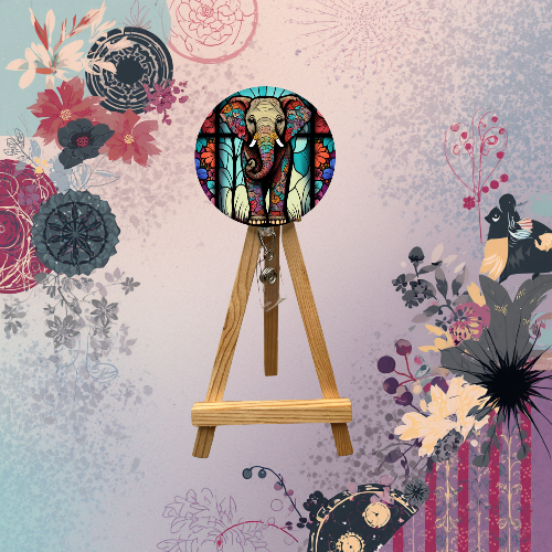 Elephant badge pulls with glitter shown on an easel surrounded by floral patterns and colorful designs.