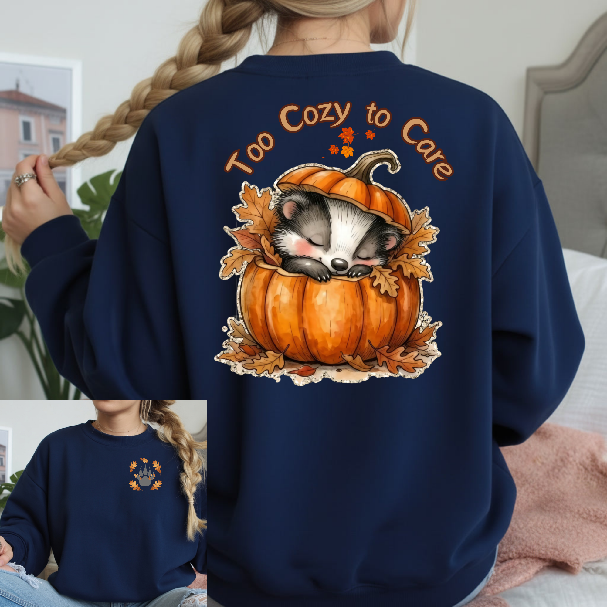 Too Cozy to Care Long Sleeve Pocket Tee with graphic featuring a cute badger in a pumpkin design.
