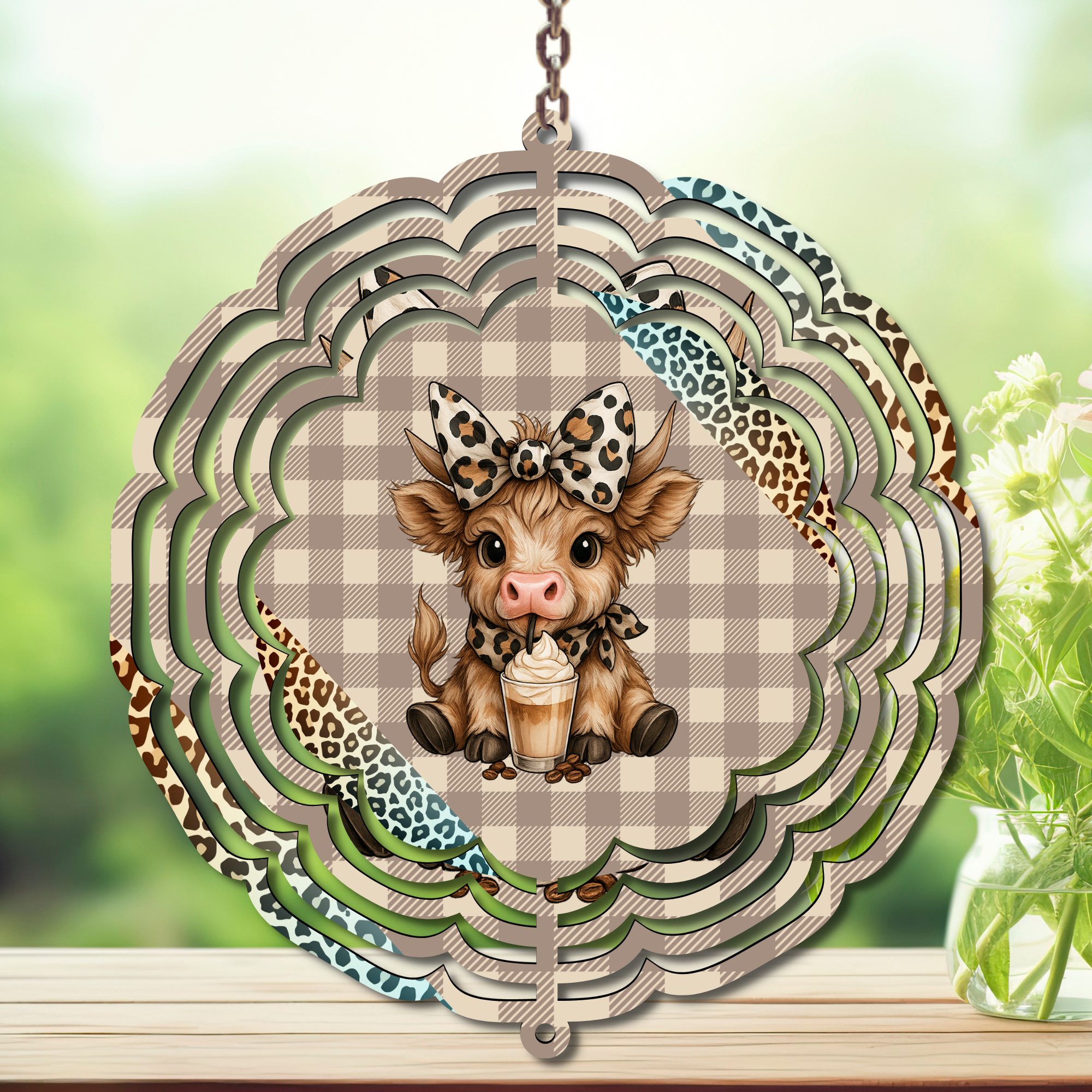 Coffee wind spinner decoration featuring a cute cow holding a coffee cup with a stylish bow, perfect for hanging outdoors.