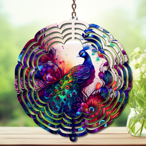 Peacock Aluminum Metal Wind Spinner, multiple images available. A swirl of peacock beauty in every breeze. TheCraftNook