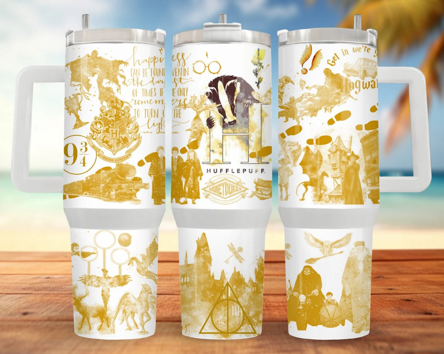 Badger House Pride stainless steel tumblers featuring Hufflepuff designs, 20 and 30-ounce sizes, vibrant golden illustrations.