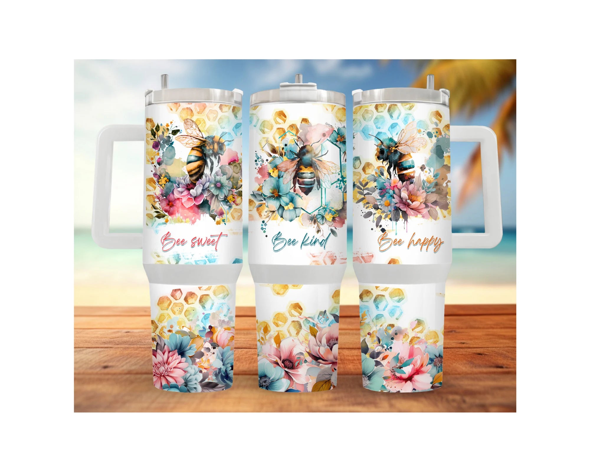 Colorful 40 and 30 oz honeybee stainless steel tumblers with floral designs and inspirational messages.