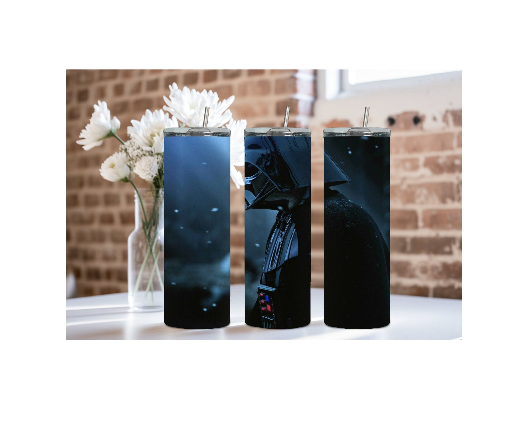 Darth Vader 20 oz tumbler trio showcasing iconic design in a stylish setting with flowers.