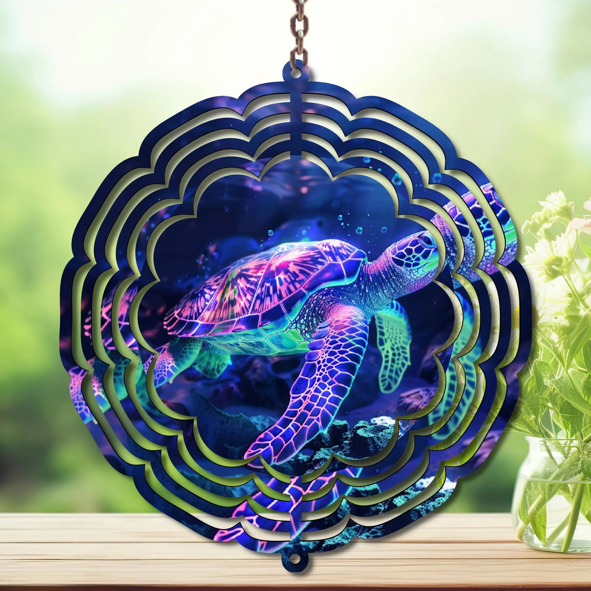 Vibrant sea turtle wind spinner garden decor with blue and purple colors, perfect for outdoor spaces.