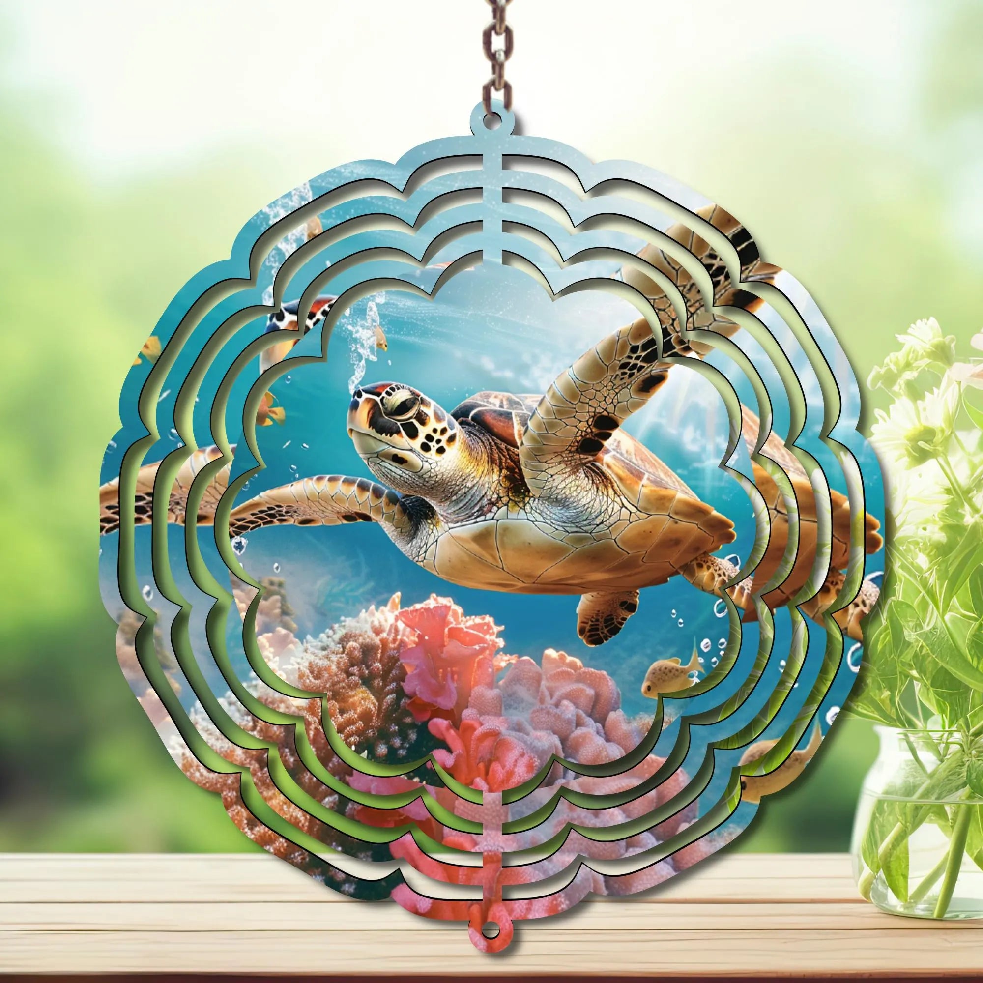 Sea turtle wind spinner garden decor featuring a colorful design with coral and ocean elements.