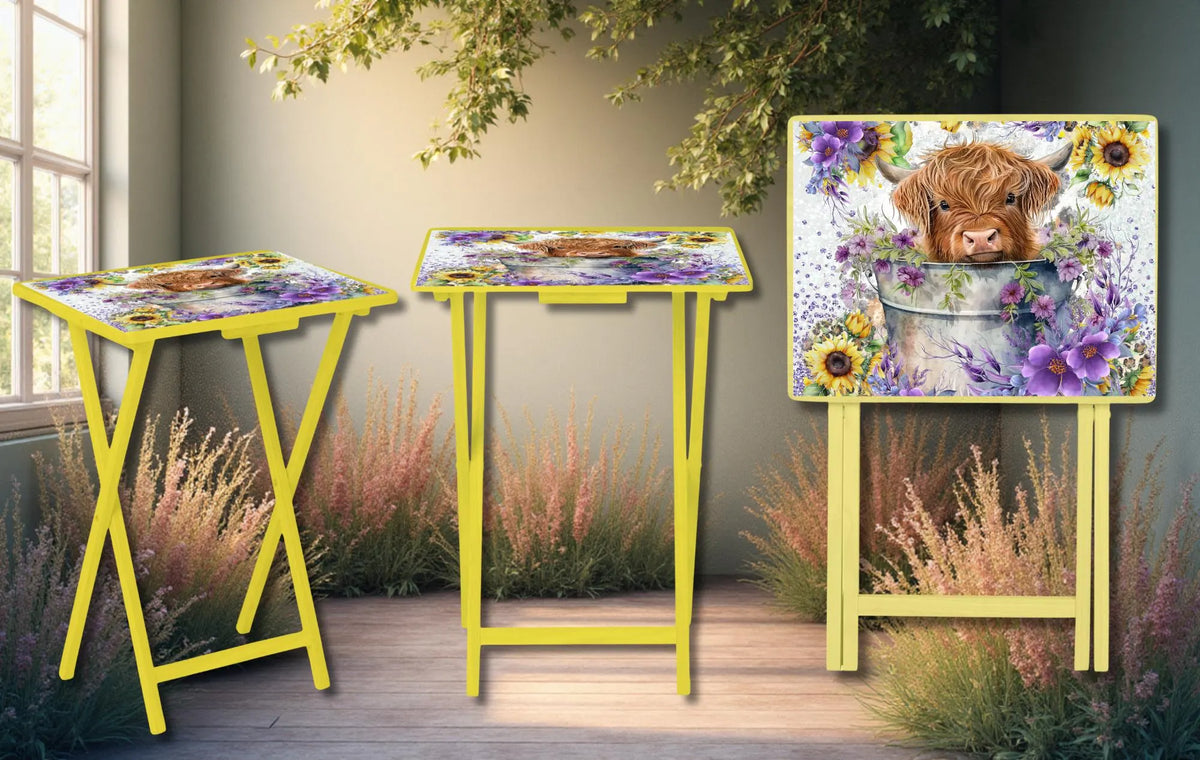 Highland cow wooden TV tray featuring floral design in a warm, inviting setting, perfect for farmhouse decor.
