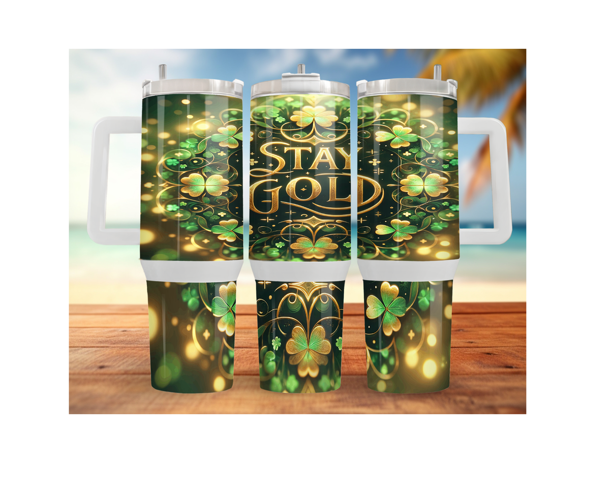 St. Patrick's Day tumbler 30 40 oz featuring green clovers and "STAY GOLD" text with gold accents and festive design.
