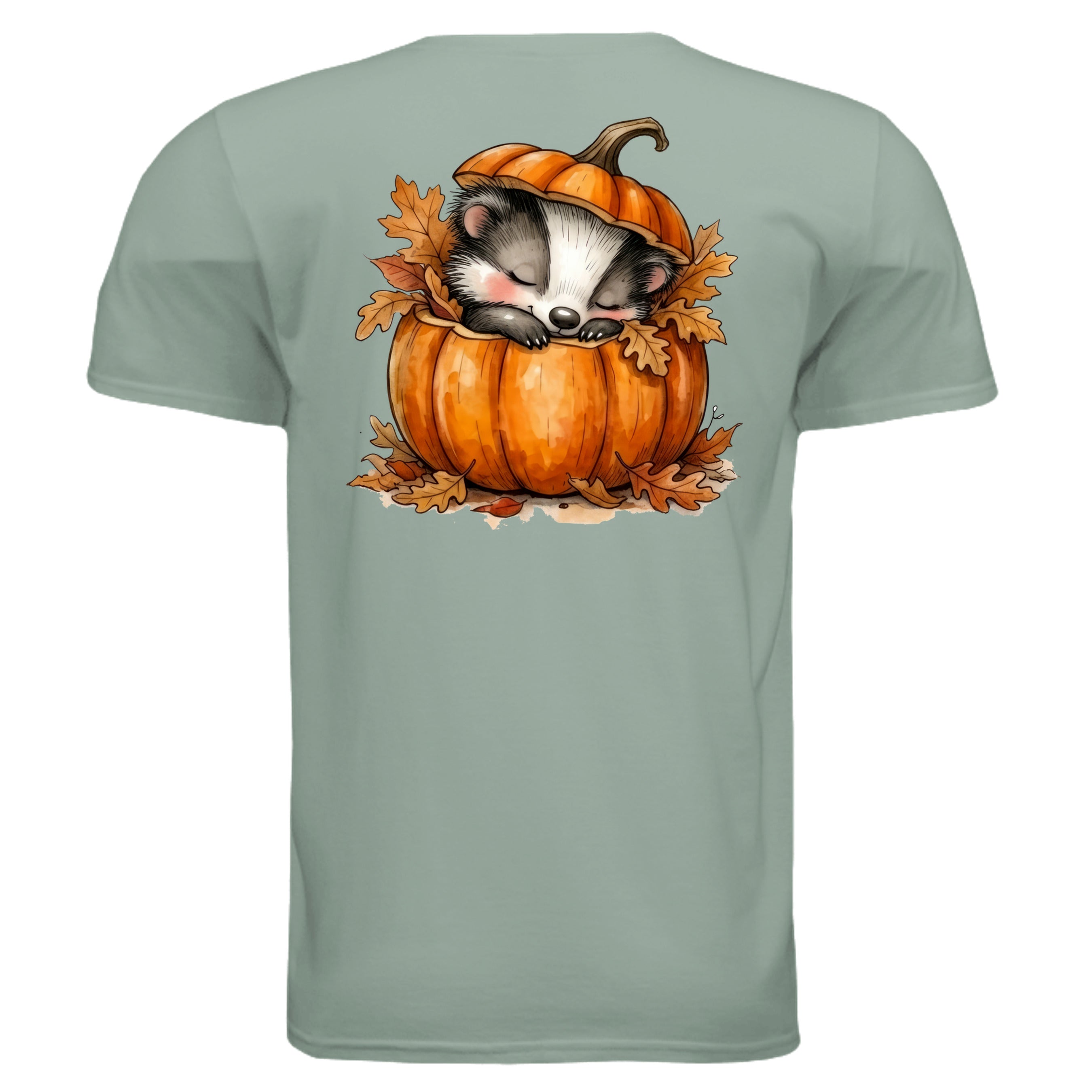 Cozy pocket graphic tee featuring a cute badger sleeping inside a pumpkin with autumn leaves.