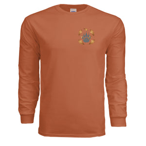long sleeve pocket tee with graphic in TEXAS ORANGE featuring a bear paw design and autumn leaves.
