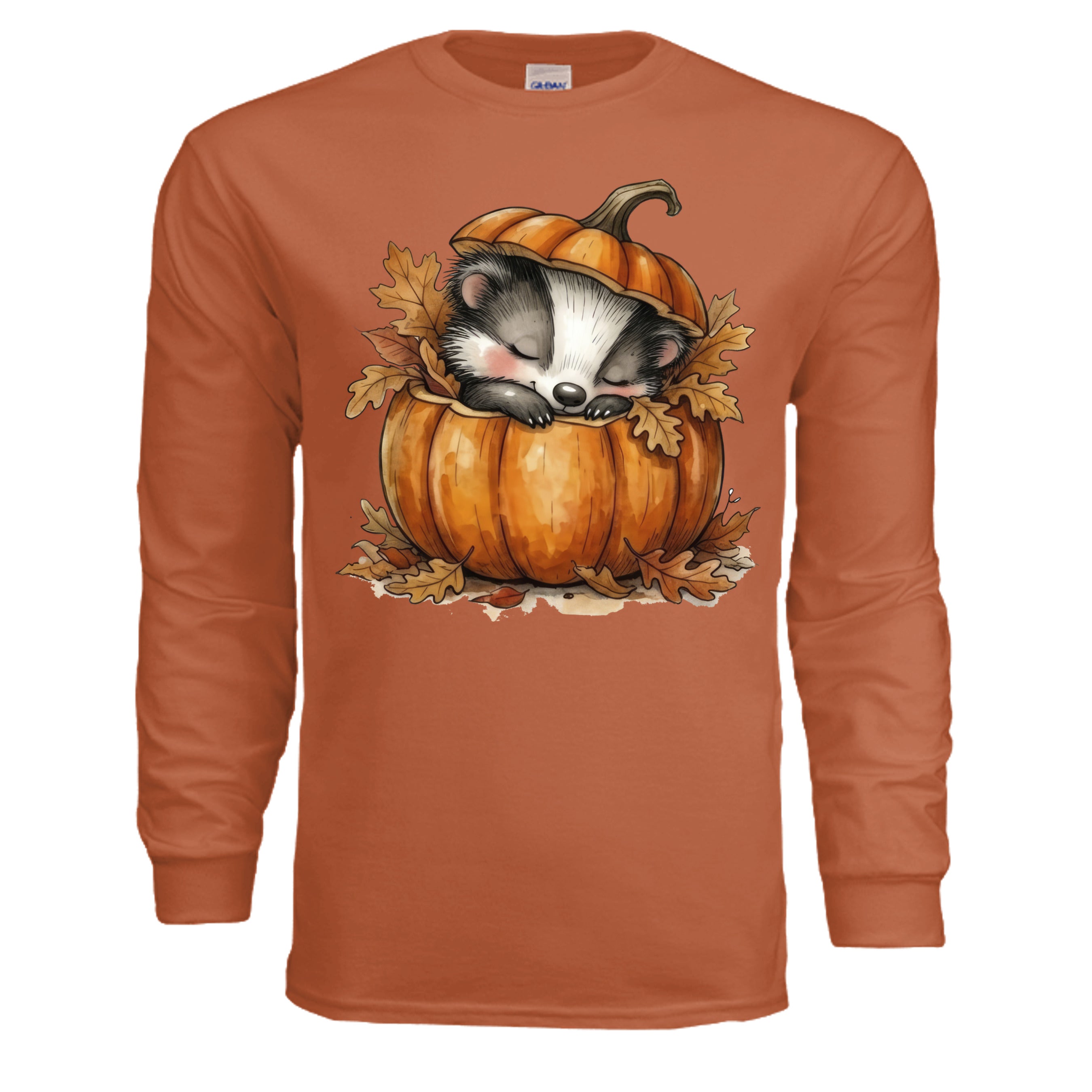 Cozy Badger Long Sleeve Tee in Texas Orange featuring a cute badger sleeping in a pumpkin with fall leaves.