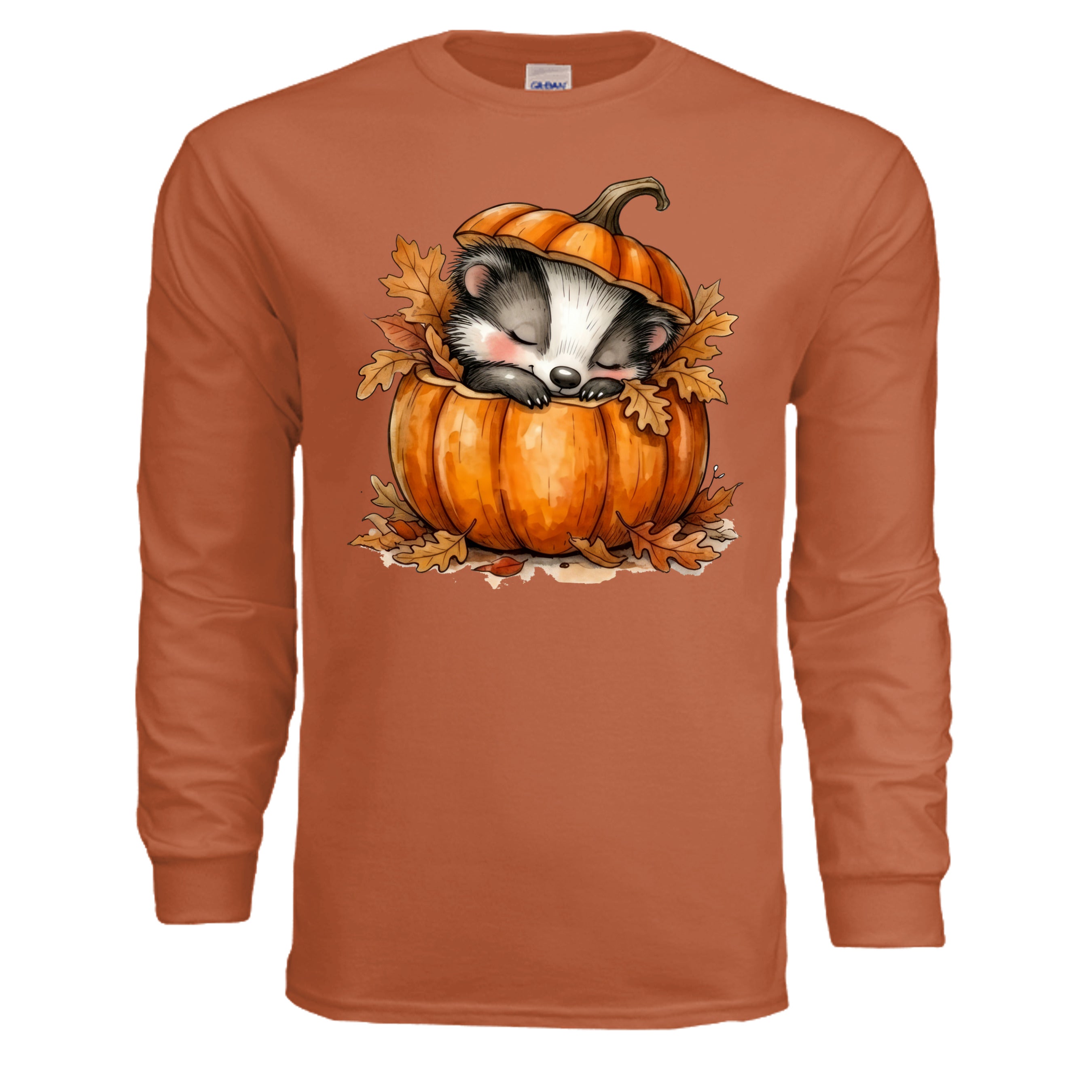 Cozy Badger long sleeve tee in TEXAS ORANGE featuring a sleepy badger in a pumpkin with autumn leaves.