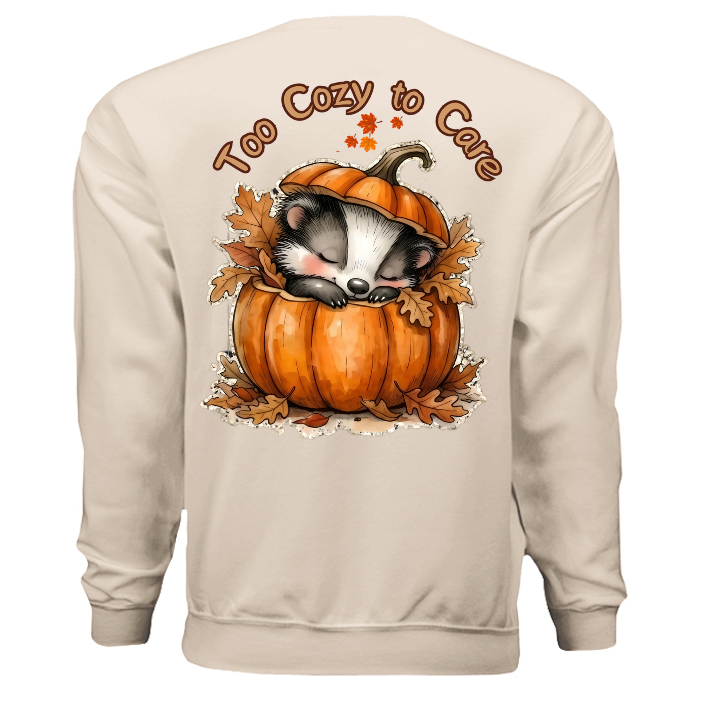 Graphic cozy sweatshirt with pocket featuring a cute sleeping animal in a pumpkin design.