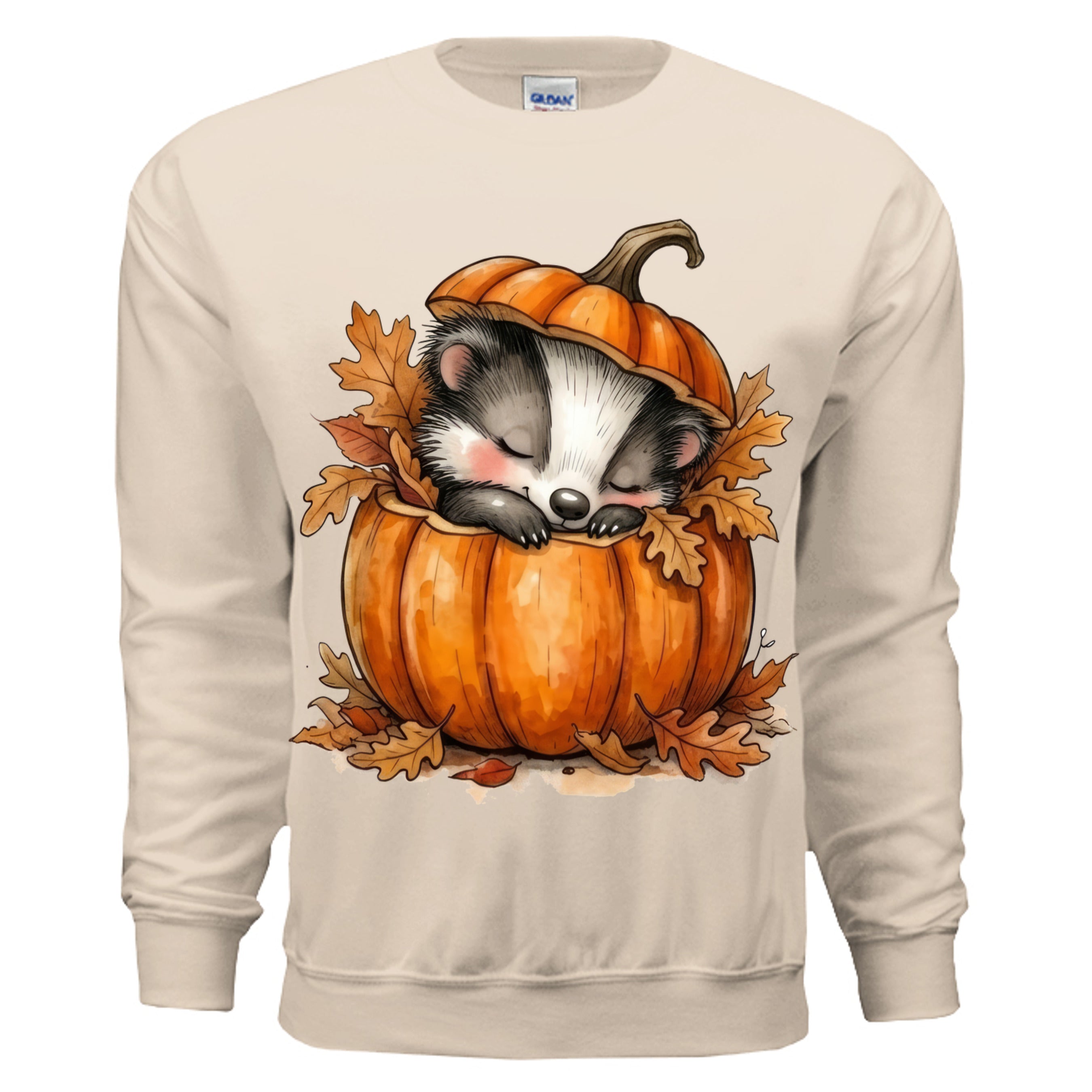 Cozy forest edition badger sweatshirt with badger graphic nestled in a pumpkin surrounded by autumn leaves.