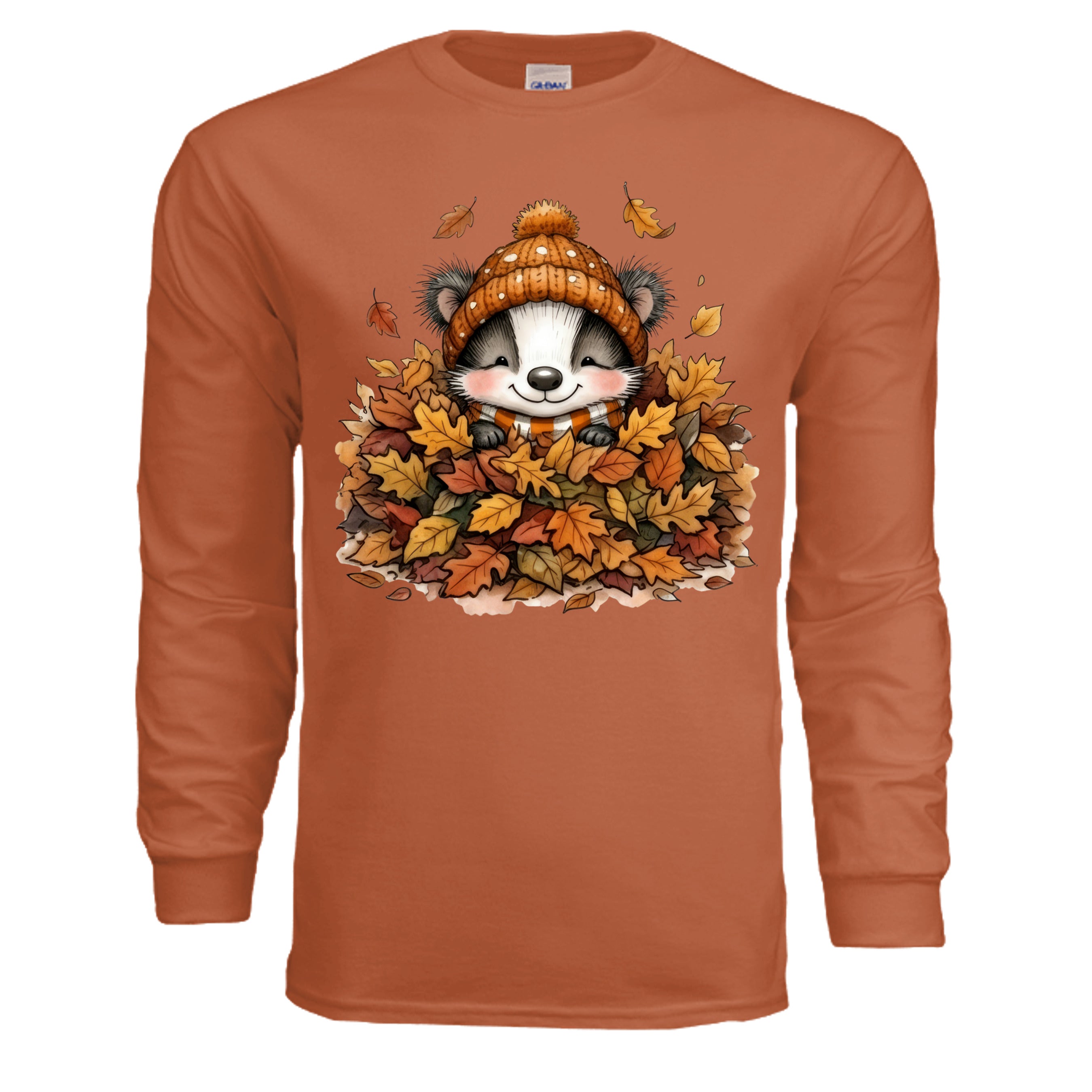 Leaf Pile Badger Long Sleeve Tee in Texas Orange with playful badger graphic among autumn leaves