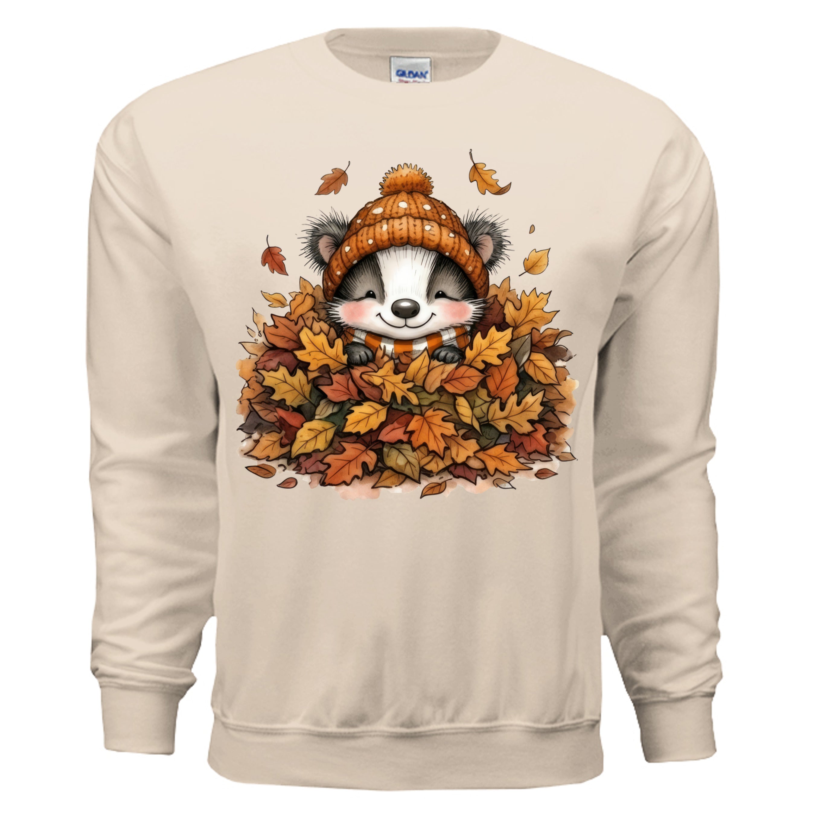 Leaf Pile Badger Sweatshirt in sand color featuring fall graphic sweatshirt with playful badger and autumn leaves design.