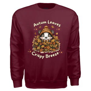 Autumn Leaves Sweatshirt featuring a cute raccoon in maroon fleece with autumn leaves graphic for cozy fall days.