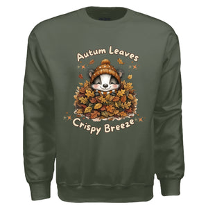 autumn leaves sweatshirt in military green with cute raccoon graphic and fall leaves design