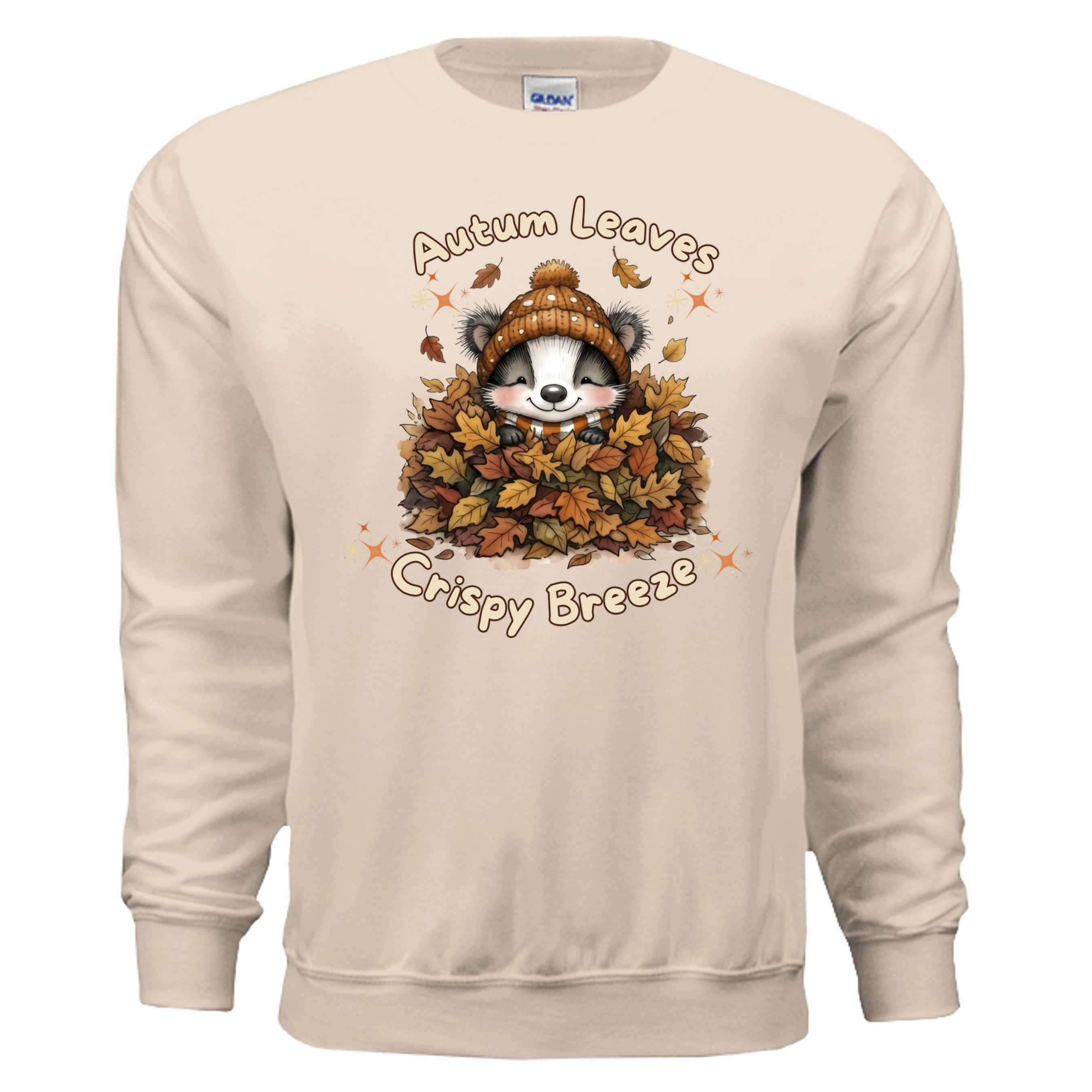 autumn leaves graphic sweatshirt featuring a cute raccoon in a pile of leaves, on a sand-colored fleece crew.